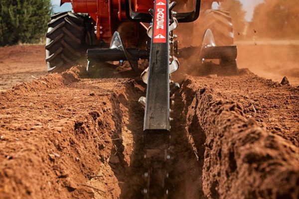 machine digging and trench