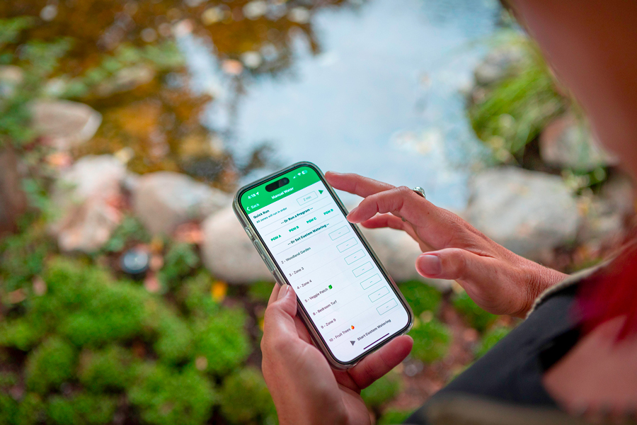 Person using RainBird mobile app